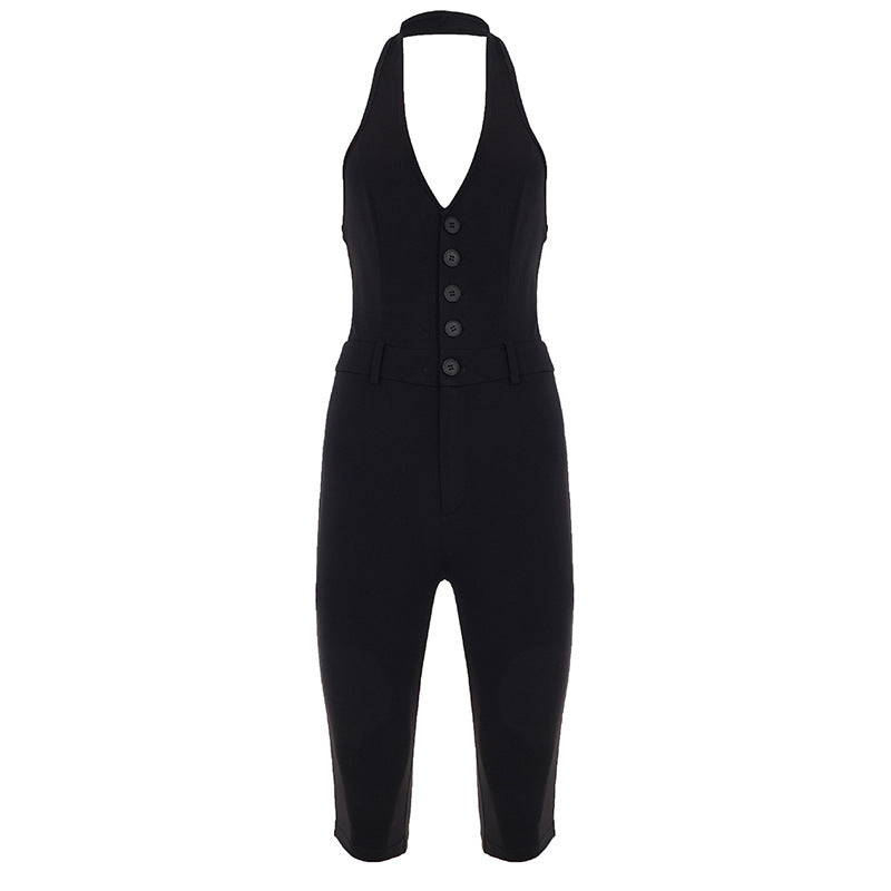 Dame figursyet jumpsuit med elegant halterneck og knapliste Skovae