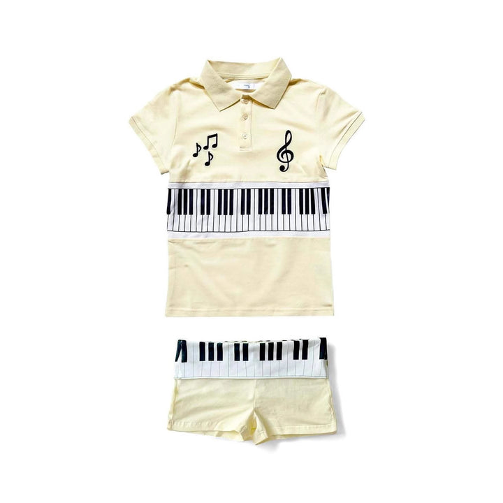 Dame polo shirt og shorts sæt med musikalsk design Skovae