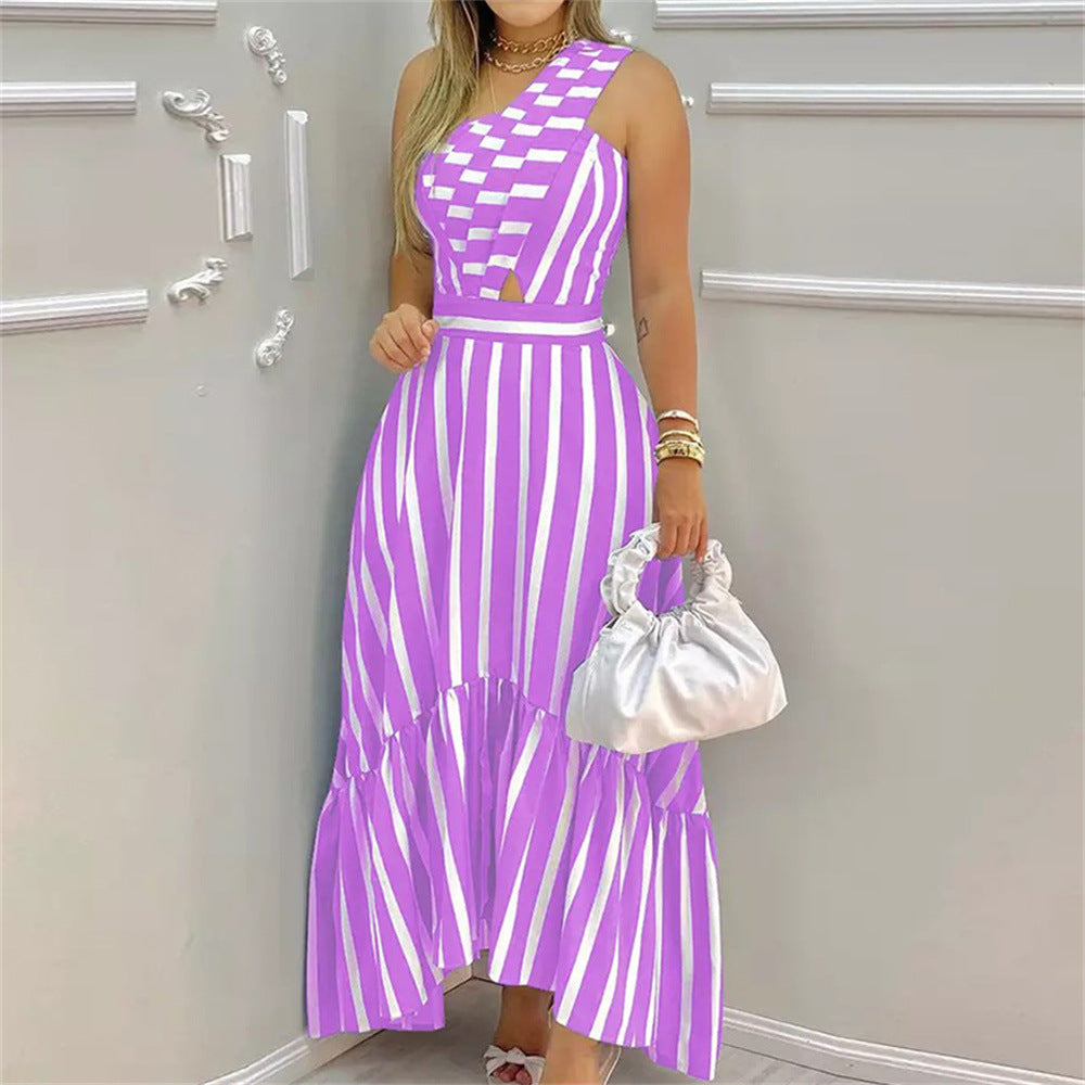 Dame maxikjole med asymmetrisk snit og trendy cut-out Stilla