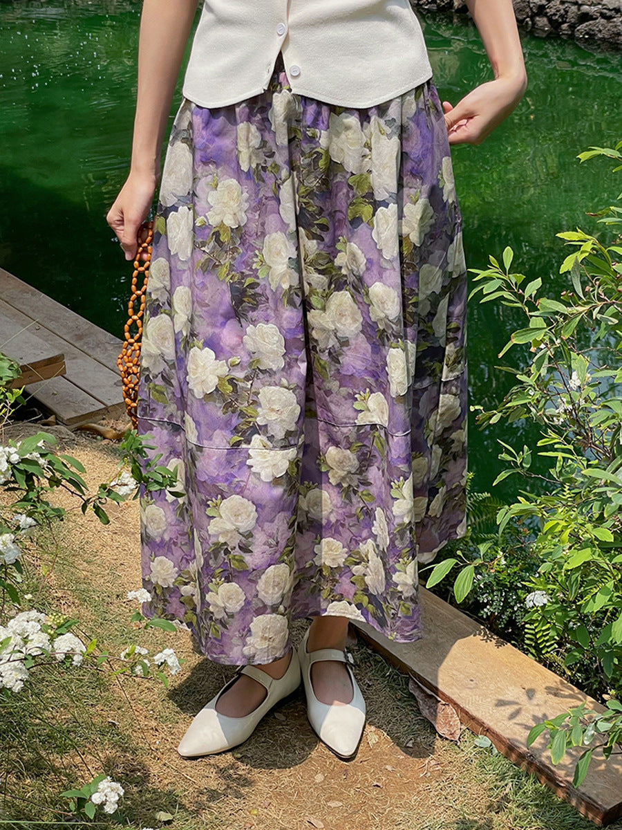 Dame ærmeløs blusesæt i let stof med blomsterdesign og svingende nederdel Stilla