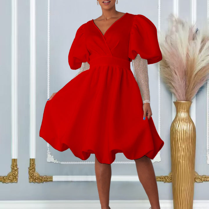 Dame viklerekjole med elegante puffærmer og livligt indslag Stilla