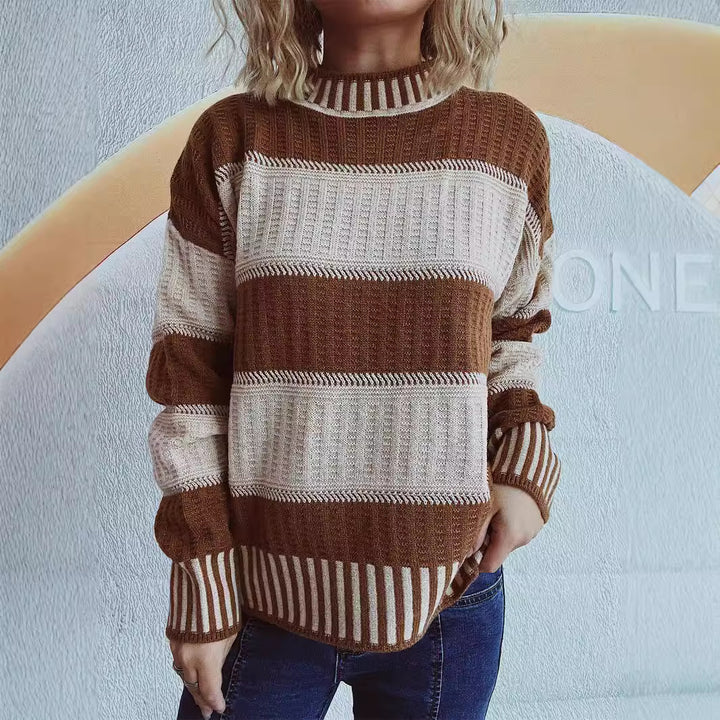 Kvindernes stilfulde strikkede sweater med unikt stribemønster og høje manchetter Stilla
