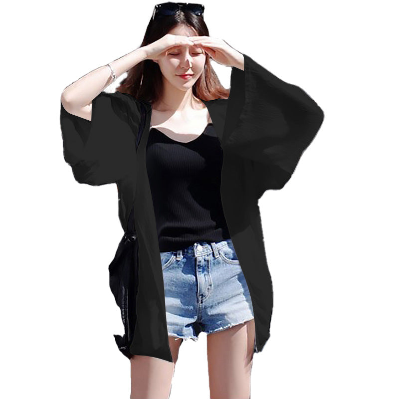 Damer elegant kimono jakke med en løs pasform og detaljeret designede ærmer