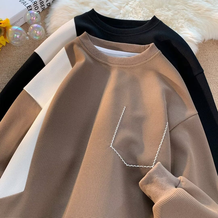 Dame mode sweatshirt med unikt design og praktisk brystlomme Stilla