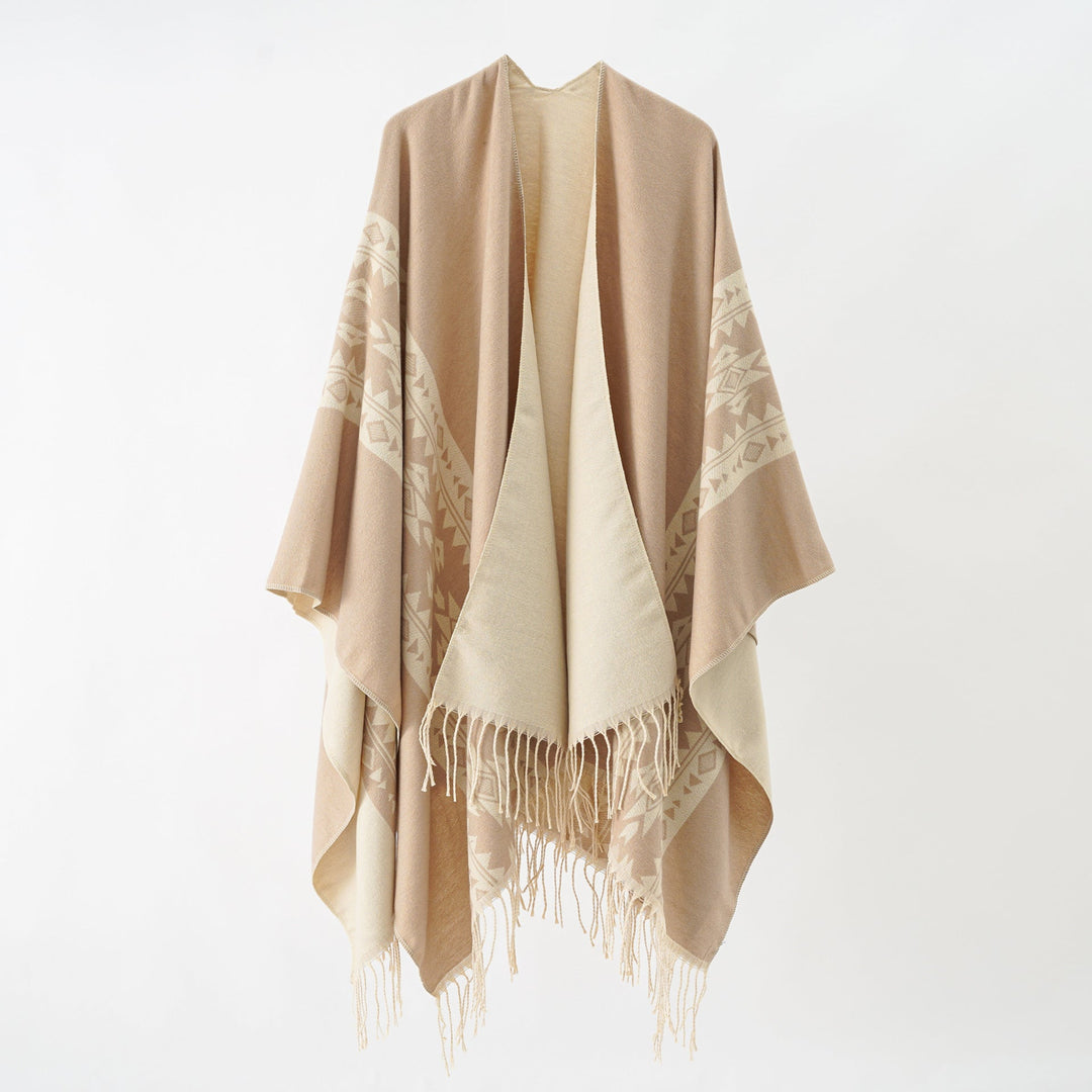 Dame Elegant Strikponcho med Kunstneriske Frynser og Blomsteragtige Accenter Skovae