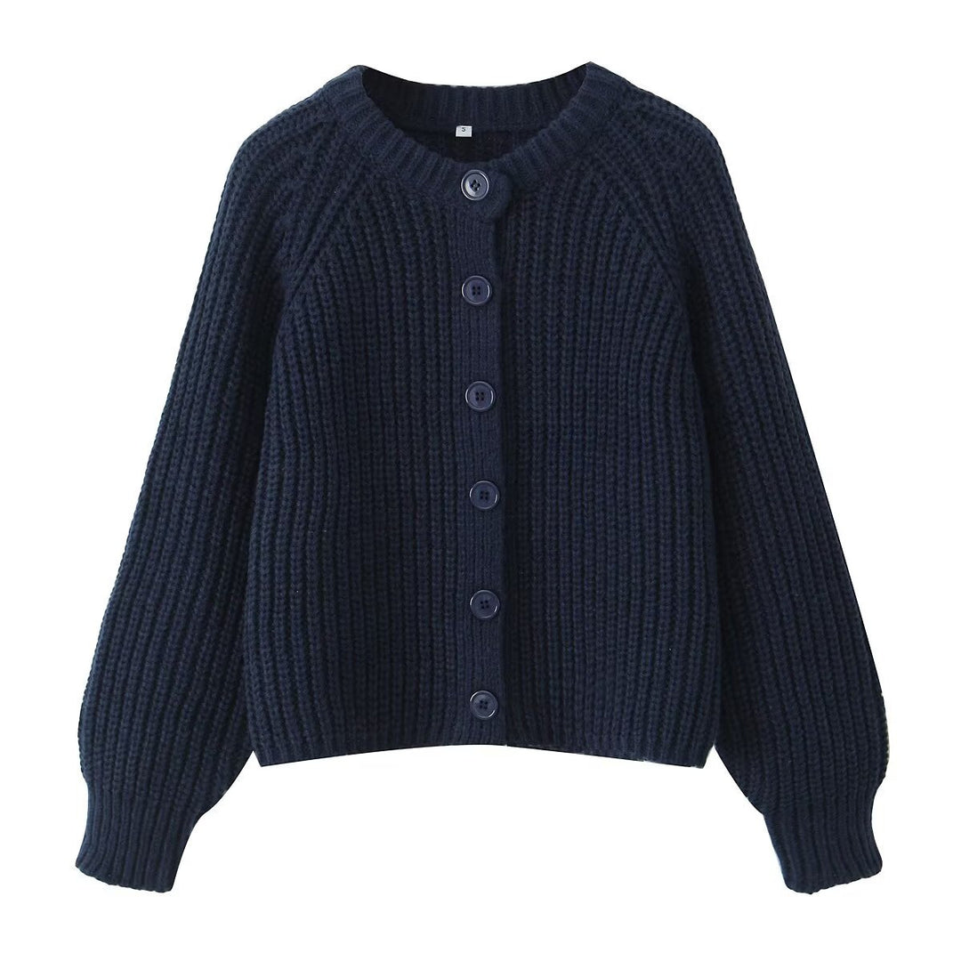 Dame strikjakke med struktureret mønster og dekorative knapper Stilla