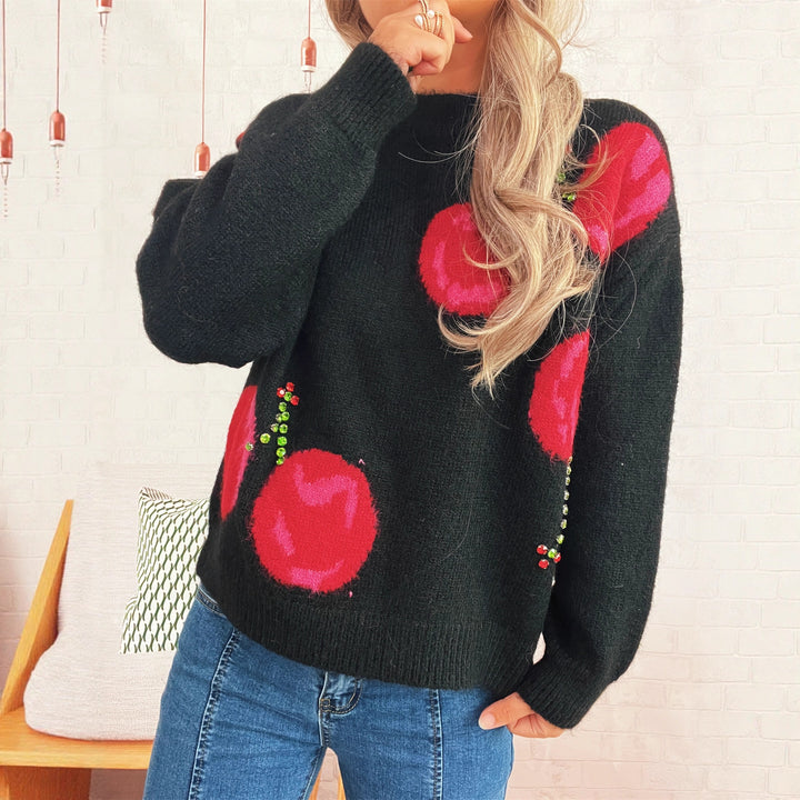 Kvinders hyggelige strikket sweater med blomsterapplikationer og glitrende accenter Stilla