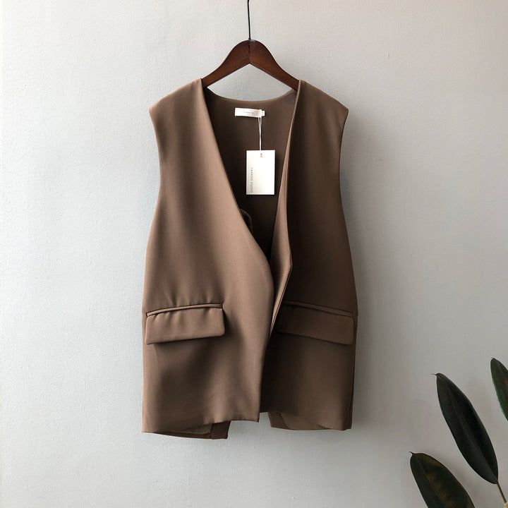 Dame elegant vest med dyb V-udskæring og praktiske lommer Stilla