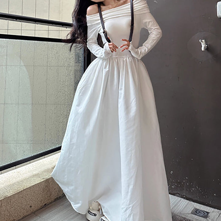 Kvindernes elegante off-shoulder maxikjole med moderne stropdetaljer Skovae