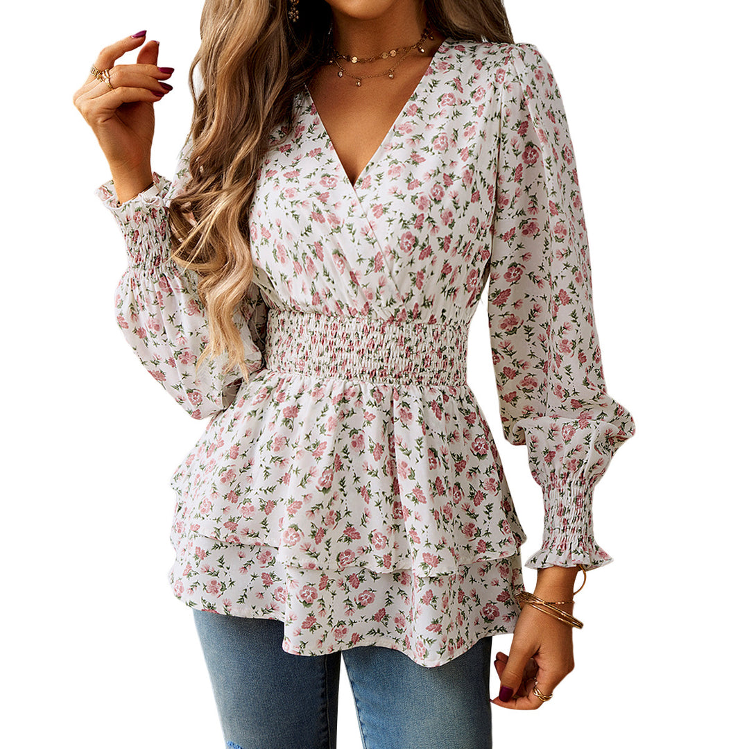 Damebluse med florale detaljer og elastisk taljeindsats Stilla