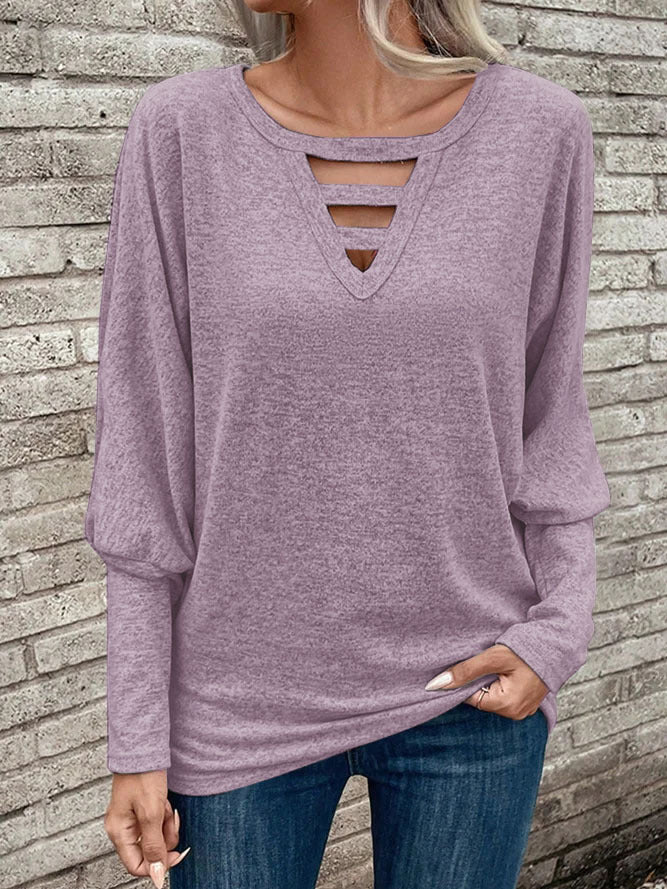 Dame afslappet sweater med dekorativ V-udskæring og cut-out-detaljer Stilla