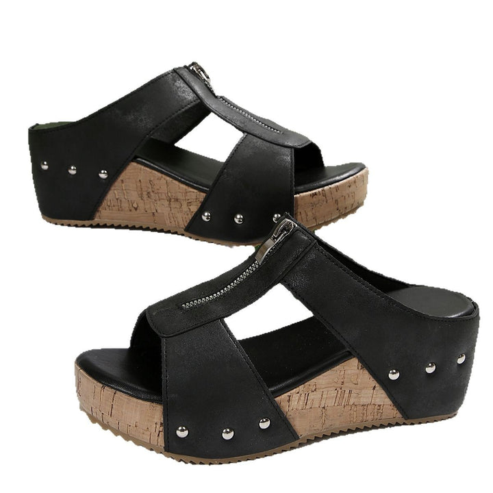 Dame Wedge-Pantoletten med stilfuld lynlås og elegant korksål Stilla