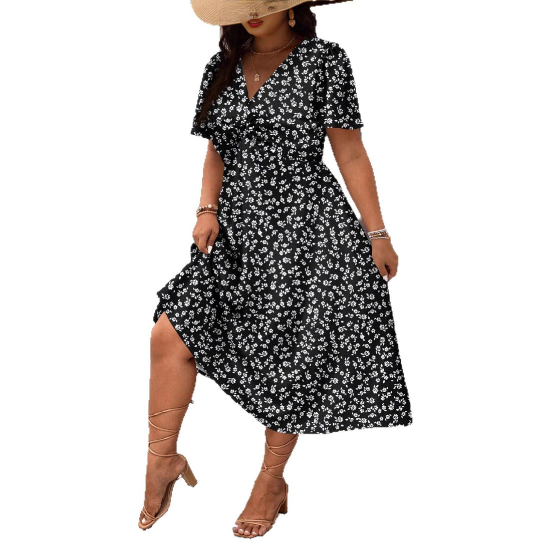 Dame Midi-kjole med blomsterprint og flattering slids Skovae