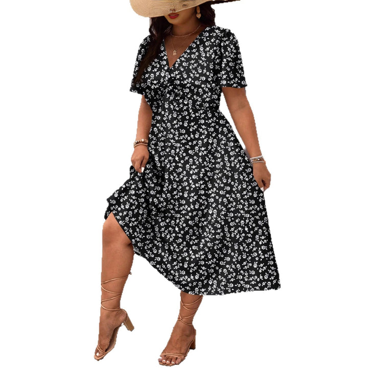 Dame Midi-kjole med blomsterprint og flattering slids Skovae