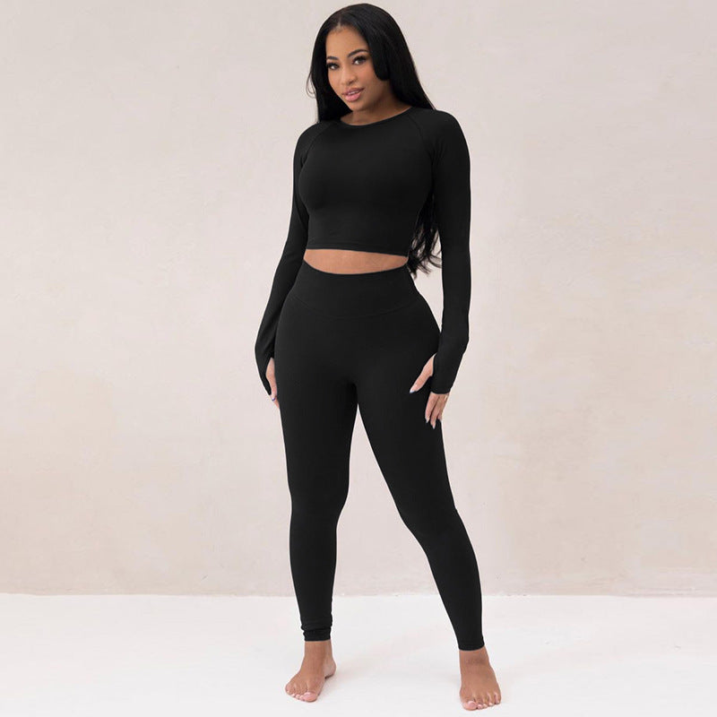 Dame Sporty sæt bestående af langærmet top og leggings med høj talje og figursyet pasform Stilla