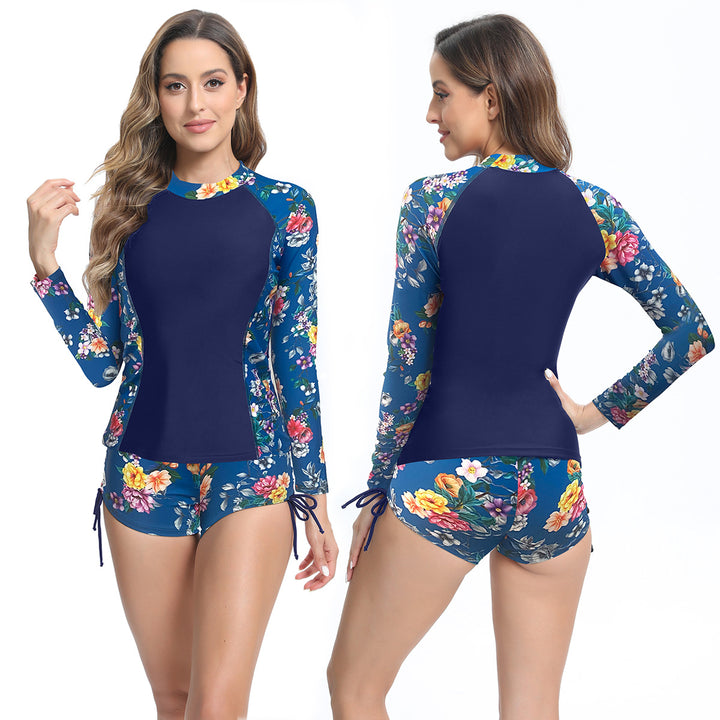 Dame UV-beskyttelse Rashguard sæt med trendy floral design og korte bukser Stilla