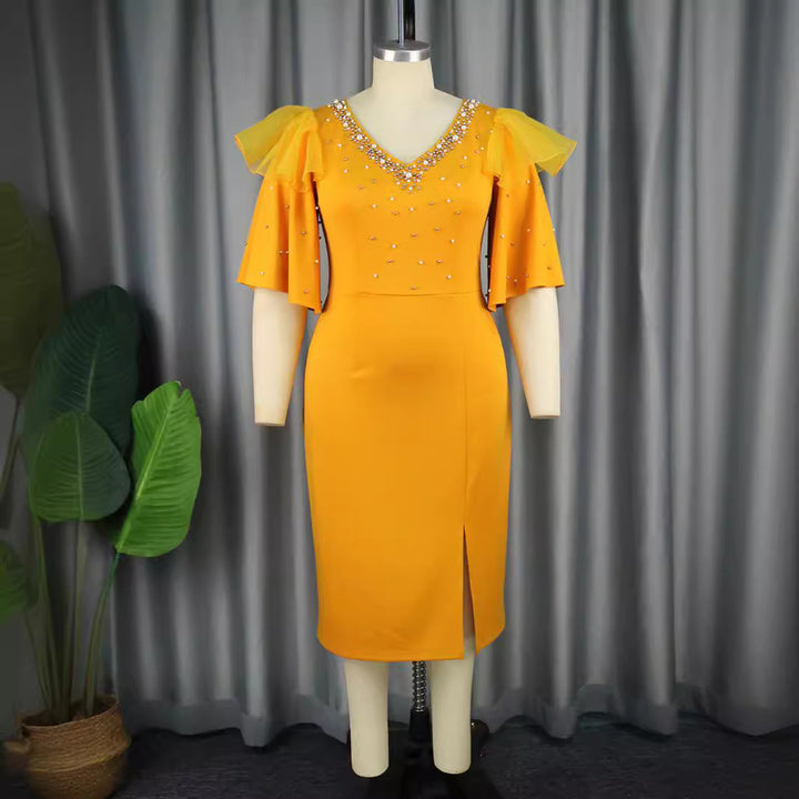 Dame elegant skinnende midi-kjole med flæse og glamourøse accenter