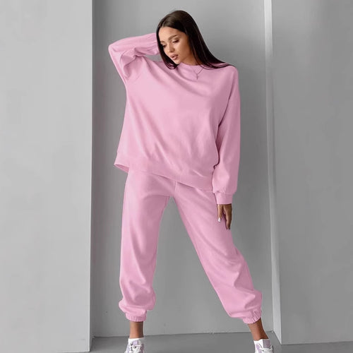 Dame afslappet sweatshirt- og buksesæt med moderne snit og elastiske manchetter Stilla