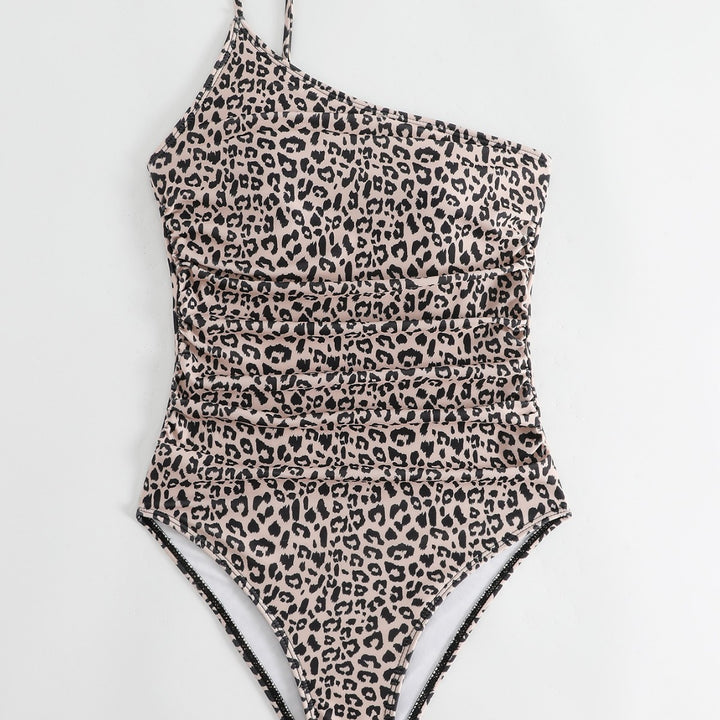 Dame én-nytter badedragt med asymmetrisk leoparddesign og figursyet snit Stilla