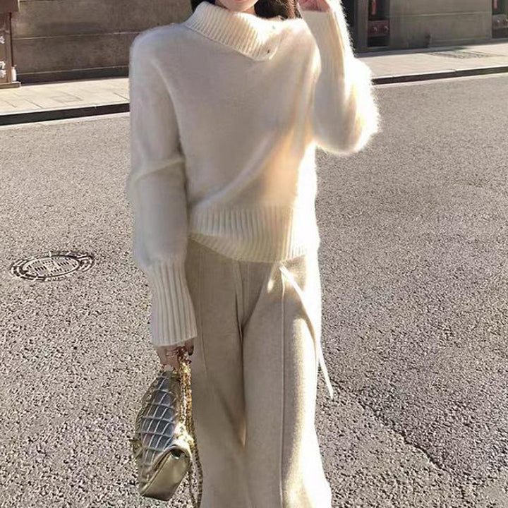 Kvinderens fashionable sweater med stilfuld turtle neck og fin ribbeting struktur Stilla