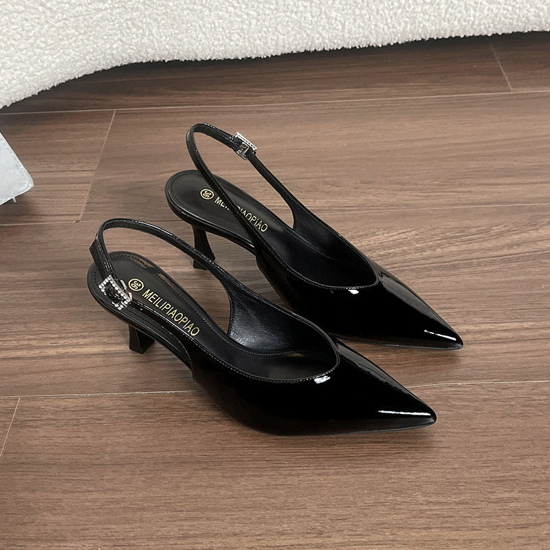 Dame Sling-Pumps med elegant spids form og justerbar rem Stilla