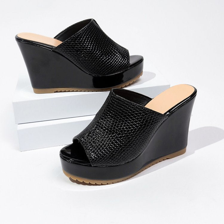 Dame Wedge-sandaler med elegant prægede overdel og moderigtigt accent Stilla