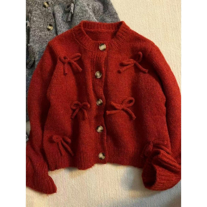 Kvinders cardigan med dekorative sløjfer på