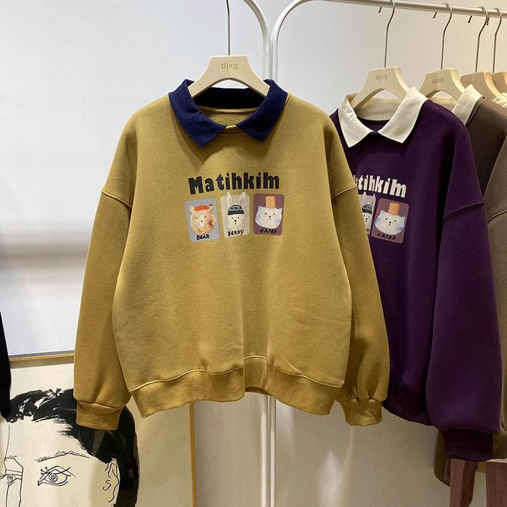 Femme Cozy Graphic Sweatshirt med stilfuld kontrastkrave Stilla