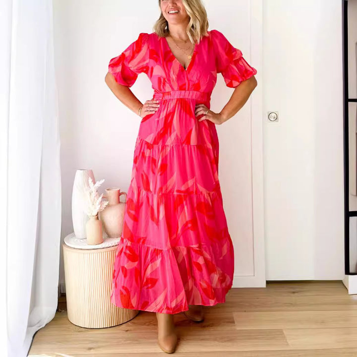 Dame Maxikjole med voluminøse pufærmer og blomsterprint Stilla
