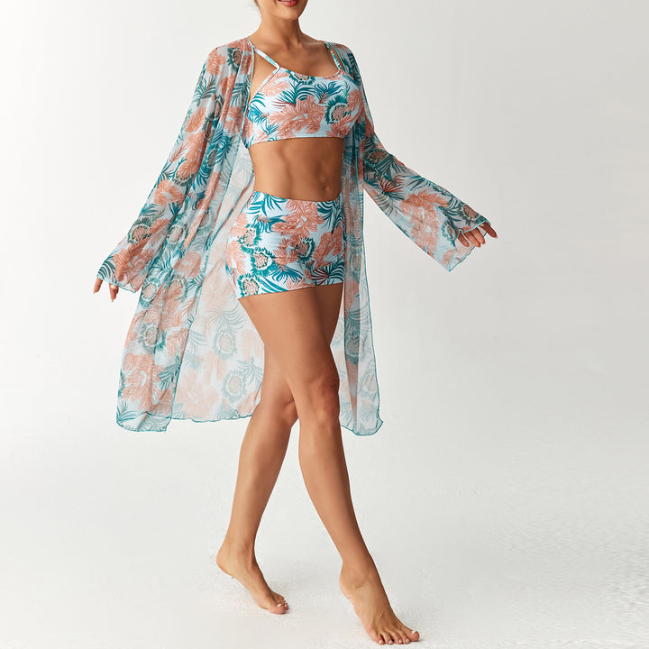 Dame strandoutfit med blomstret design og gennemsigtig kaftan Skovae