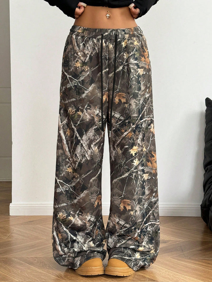 Damer Behagelige fritidshose med blomsterdesign og elastisk talje Stilla
