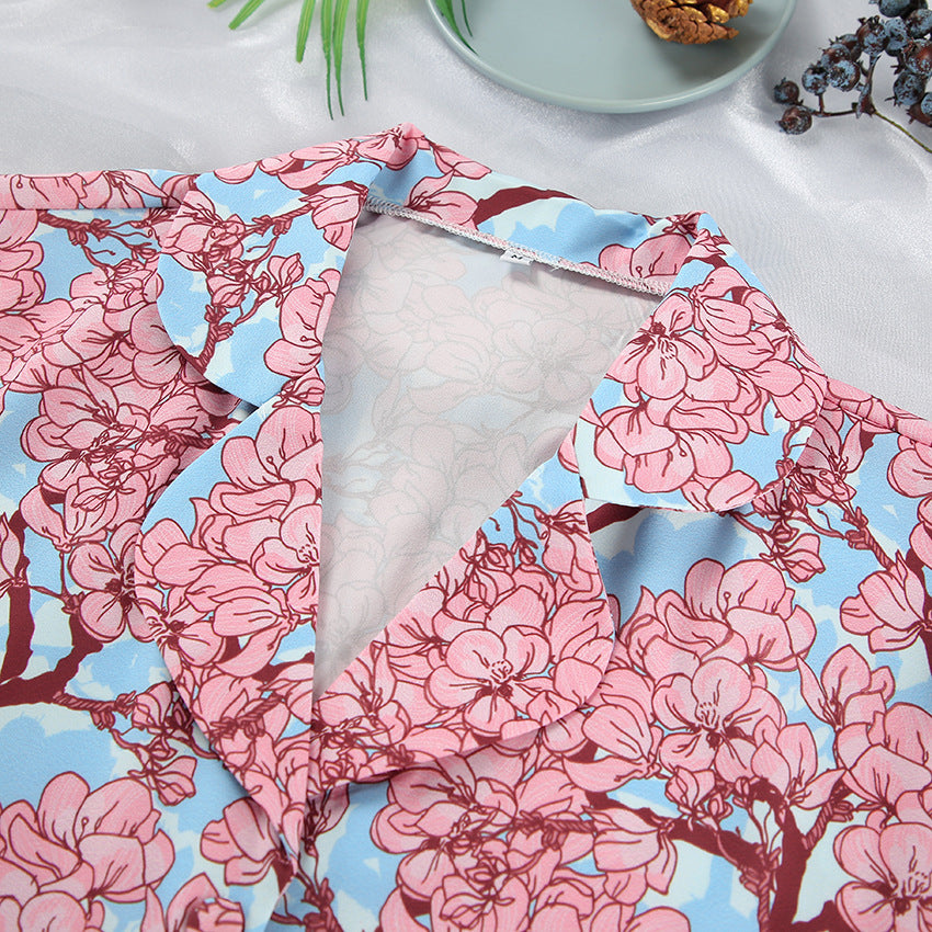 Dame satin pyjamasæt med eksklusivt blomsterprint og frynse detaljer Stilla
