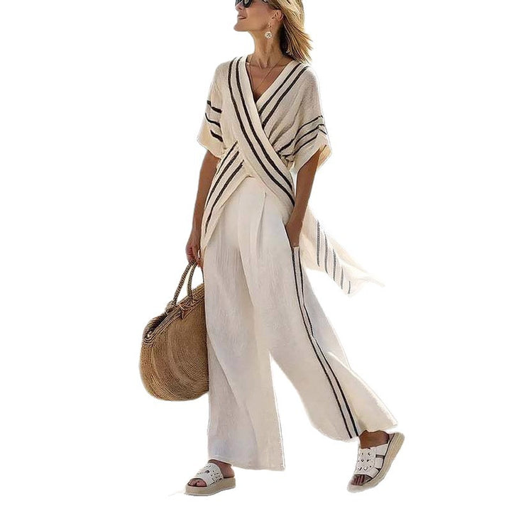 Dame nan resort-inspireret sæt med krydset kimono-tunika og højt skåret palazzo-bukser Skovae