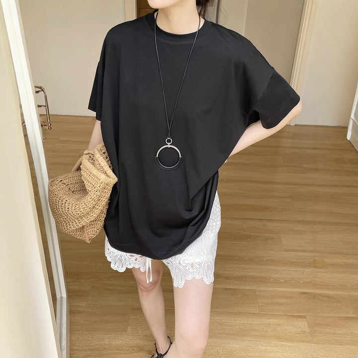 Dame afslappet T-shirt med unik snit og innovative detaljer Stilla