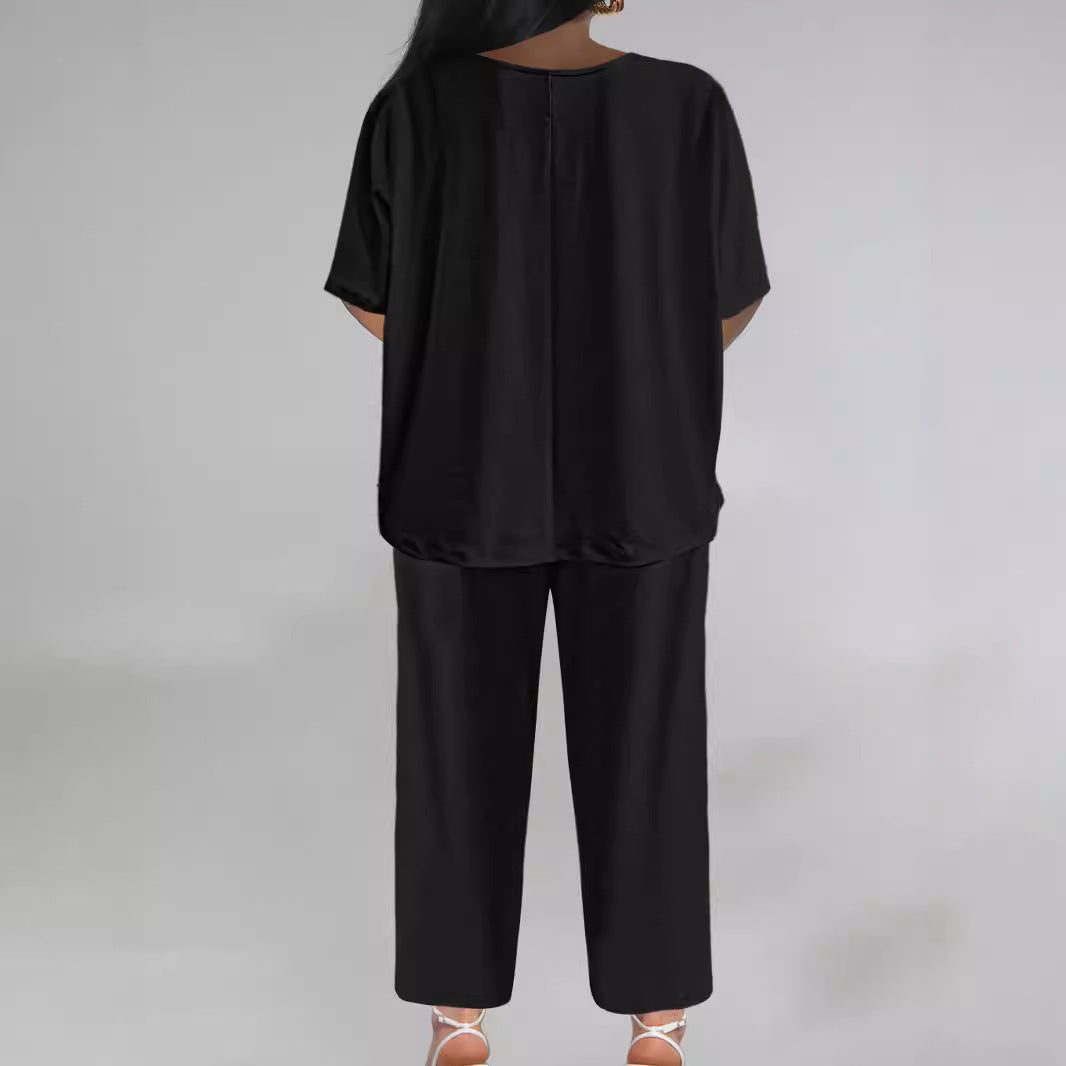 Dame jumpsuit med vidde snit og elegant V-udskæring Stilla