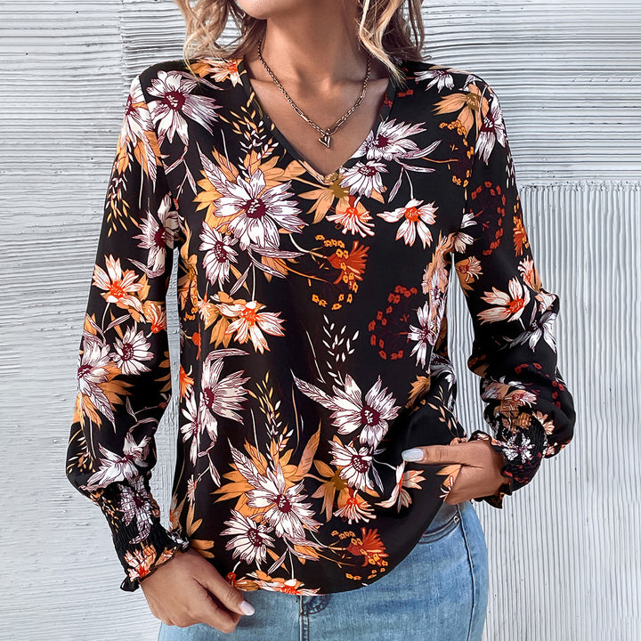 Kvindebluse med blomsterprint og elastiske flæsedetaljer Stilla