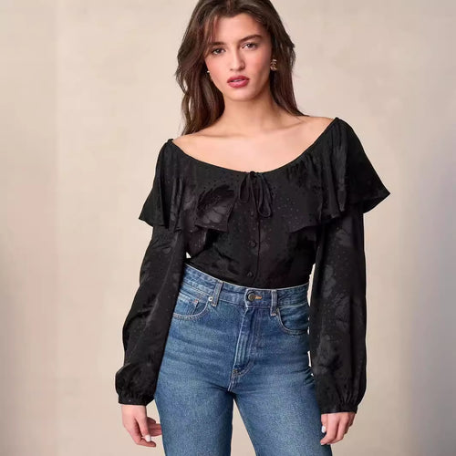 Damebluse med voluminøse flæsedetaljer og elegant V-hals Stilla