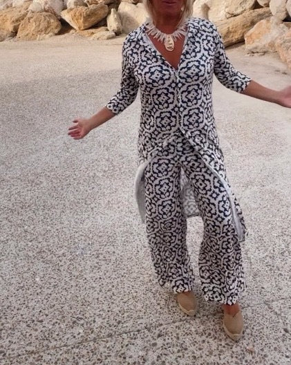 Dame maxikjole med asymmetrisk snit og elegant blomsterprint Stilla