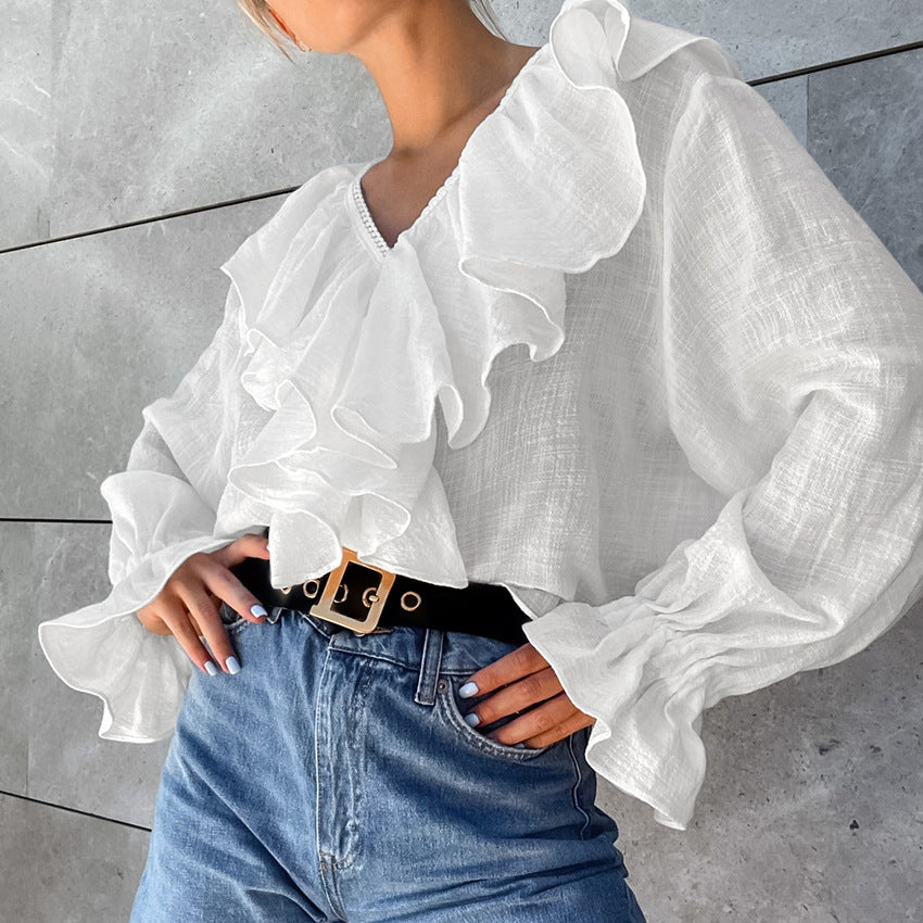 Dame rynket bluse med voluminøse ærmer og elegant afslutning Stilla