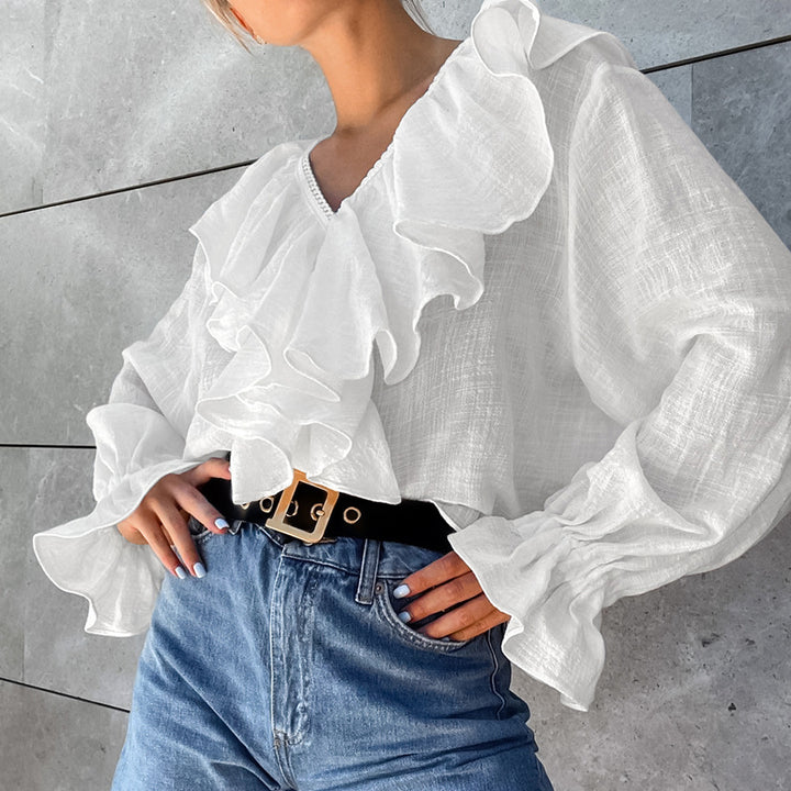 Dame rynket bluse med voluminøse ærmer og elegant afslutning Stilla