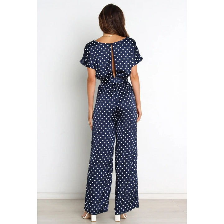 Dame jumpsuit med vidde bukseben og elegant bindebælte Stilla