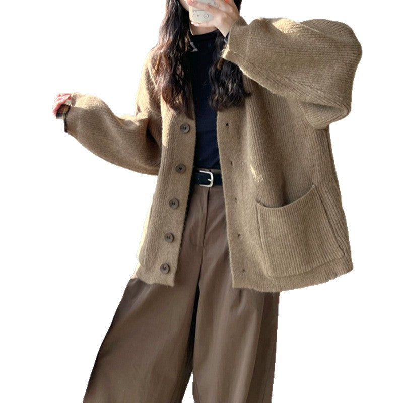 Kvindernes chunky strikket cardigan med elegante knapdetaljer og praktiske lommer Stilla