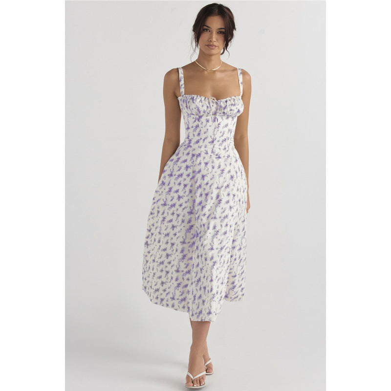 Dame maxikjole med floral design og elegant slids Skovae