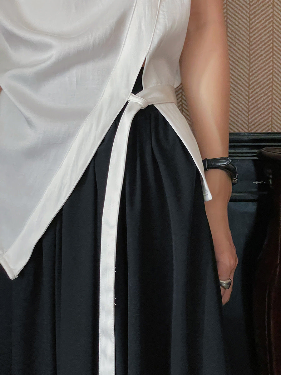 Dame indpakningsbluse med asymmetrisk snit og elegant drapering Stilla
