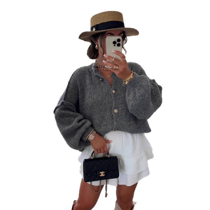 Kvinders fashionable cardigan med oversized ærmer og knapdetaljer Stilla