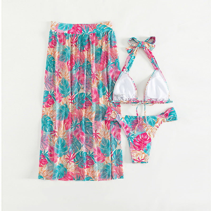 Dame bikini-sæt med blomsterdesign og gennemsigtig sarong Stilla