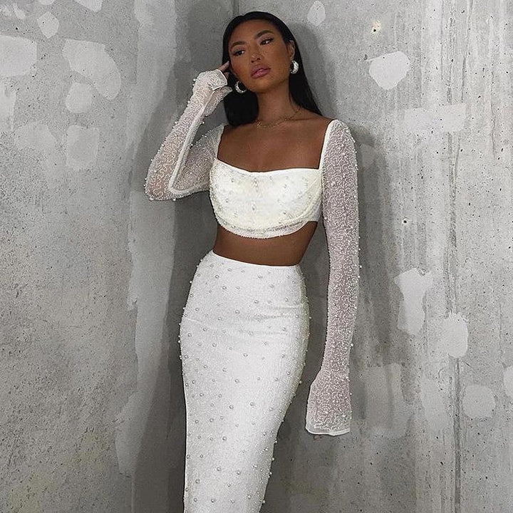Dame Elegant Crop-top med lange, gennemsigtige ærmer og glitrende accenter Skovae