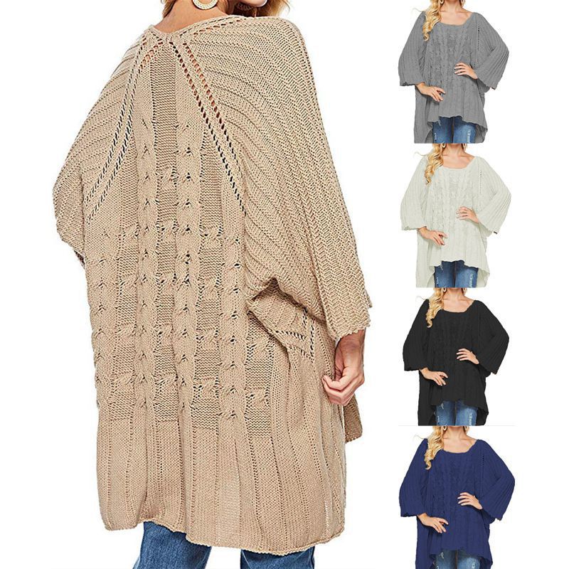 Women's chunky knit poncho with trendy cable pattern and wide sleeves Stilla