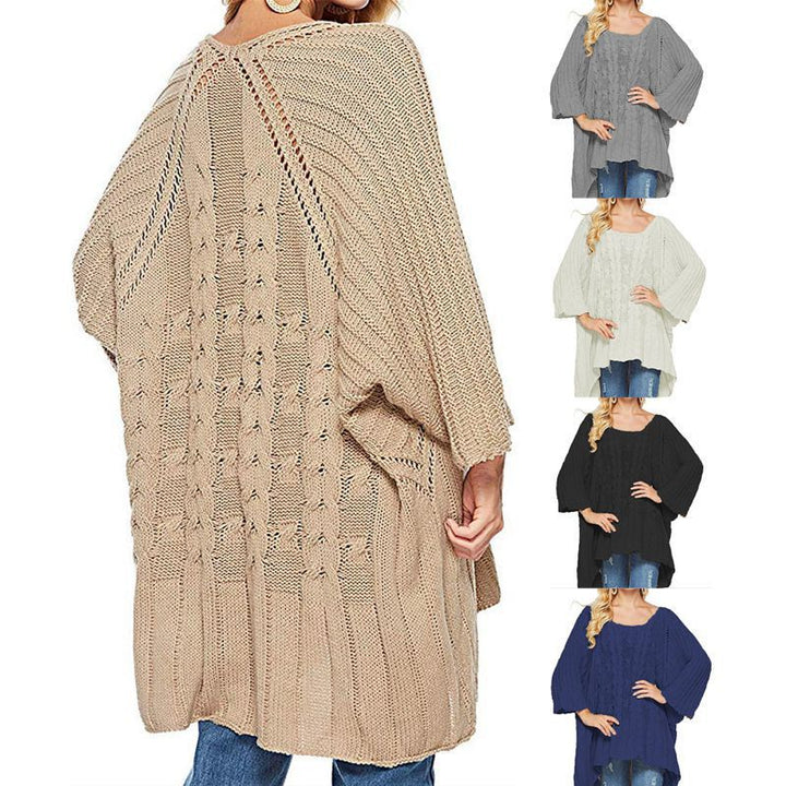 Women's chunky knit poncho with trendy cable pattern and wide sleeves Stilla