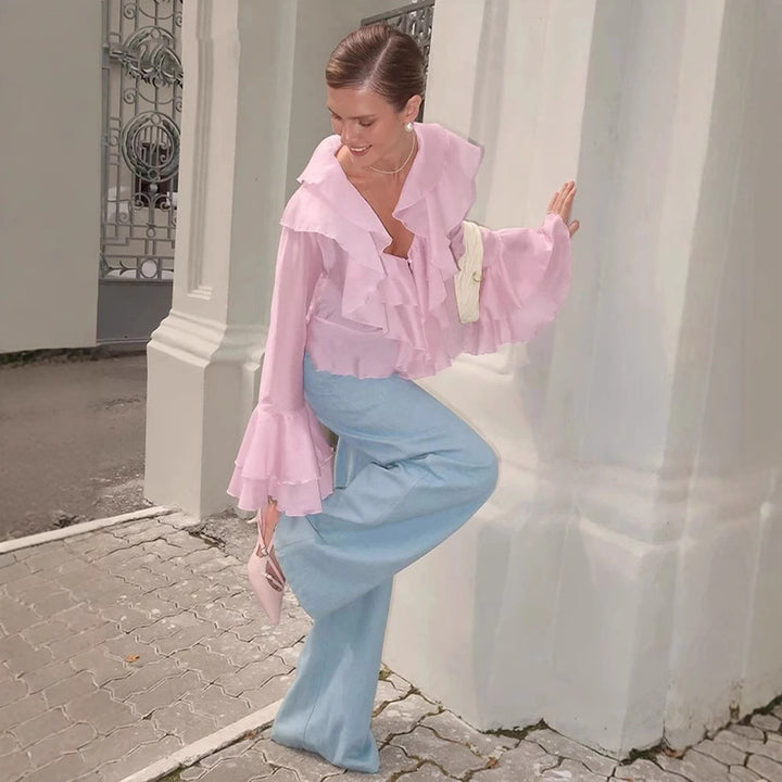 Dame rynkebluse med voluminøse ærmer og elegant design Stilla